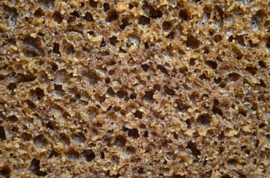 Kepekli ekmek doku. Çavdar ekmeği arka plan yakın çekim.