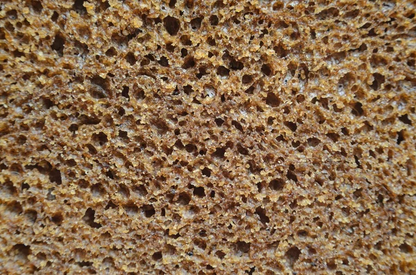 Kepekli ekmek doku. Çavdar ekmeği arka plan yakın çekim.