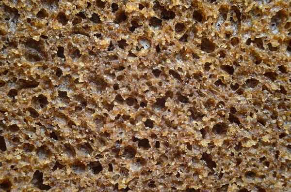 Kepekli ekmek doku. Çavdar ekmeği arka plan yakın çekim.