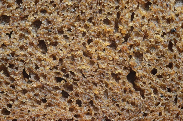 Kepekli ekmek doku. Çavdar ekmeği arka plan yakın çekim.