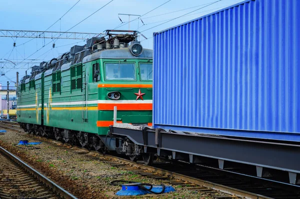 Transportation of cargoes by rail in containers. Railway infrastructure background