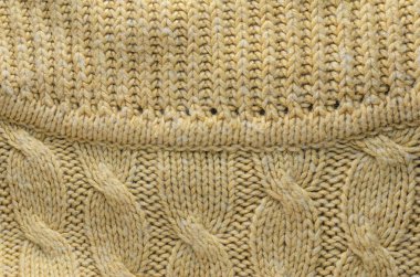 Arka plan olarak düzenli desenli örgü yün kumaş örme doku