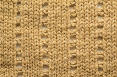Arka plan olarak düzenli desenli örgü yün kumaş örme doku