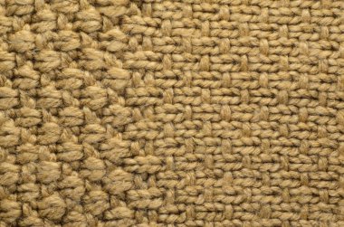 Örme kazak örgü iki tür bej doku. Arka plan olarak örgü doku.