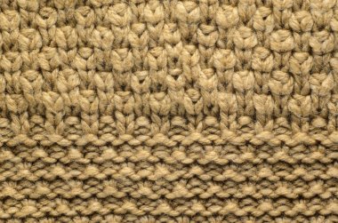Örme kazak örgü iki tür bej doku. Arka plan olarak örgü doku.