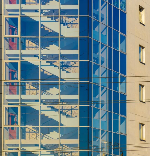 Stairwell of an Office Building Behind a Glass Facade. Building Architecture Background