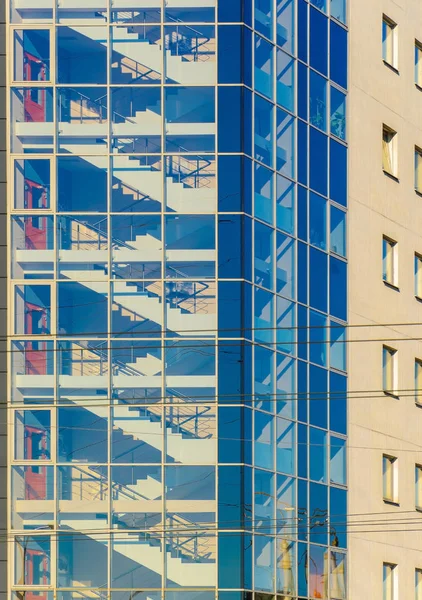 Stairwell of an Office Building Behind a Glass Facade. Building Architecture Background