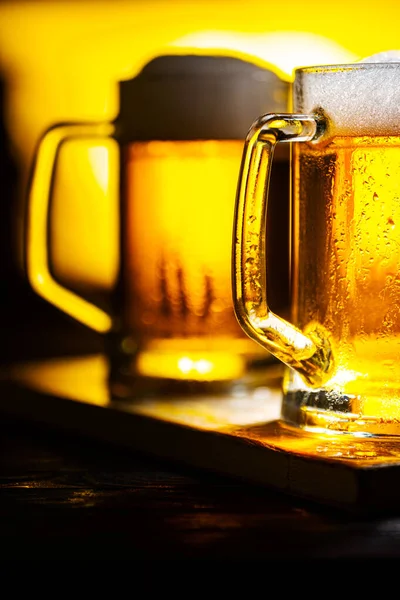 Two Light Beer Mugs with White Foam — Stock Photo, Image