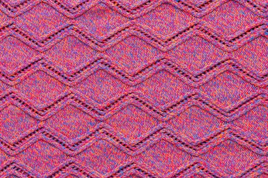 Pembe melanj örülmüş süveter dokusu