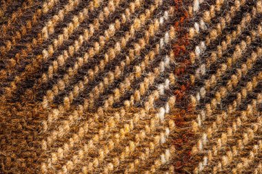 Kahverengi kumaşı kontrol etti. İskoç yünü. Kapat.