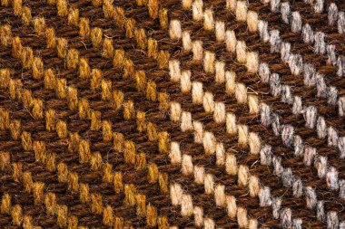 Kahverengi kumaşı kontrol etti. İskoç yünü. Kapat.