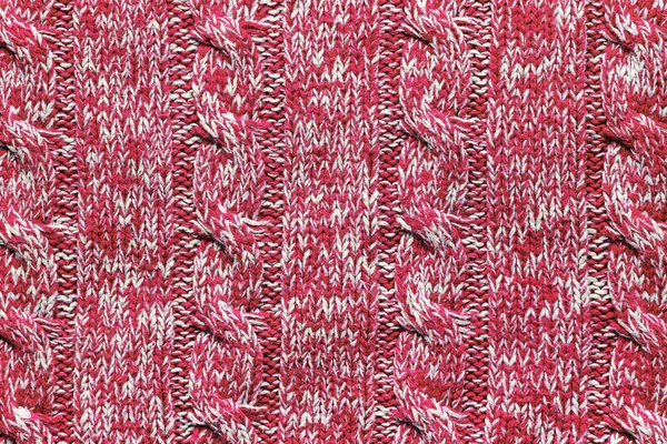 Texturen på en stickad röd vit tröja. — Stockfoto