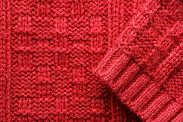 ニットセーターの質感。赤のパターン. — ストック写真