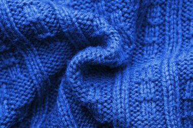 Mavi örülü süveter arka planı. Boşluğu kopyala
