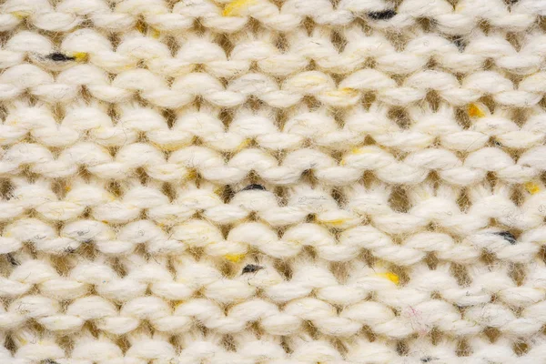 La textura de un jersey de punto beige —  Fotos de Stock