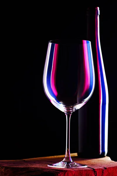 Empty glass for a wine with bottle — Stock Photo, Image