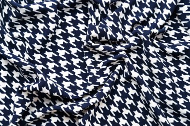 Kaz ayağı desenli kumaş.