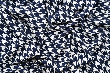 Kaz ayağı desenli kumaş.