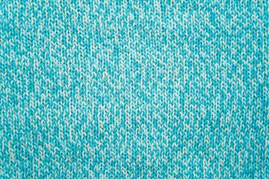 Mavi bir turkuaz kumaşın dokusu.