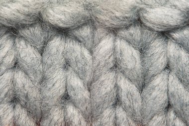 Örülmüş mavi beyaz bir süveterin dokusu. Güzel desenli arana desenleri. Geçmişi. Boşluğu kopyala