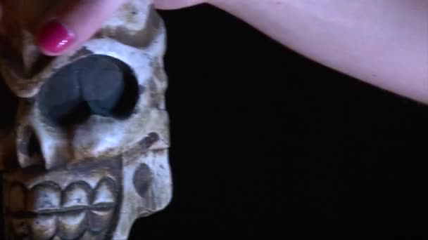 Halloween Decoration Skull Moving In Girl Hands Strobe Lights On Black Stock Video Halloween Decoration Skull Moving In Girl Hands Strobe Lights On Black Stock Video