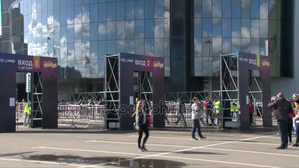 Moscow, Russia, 1 Oct, 2016: Comic con Russia entrance gates on the street, people walking around — Stock Video