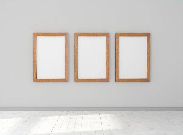 Room with empty picture frames on wall — Stock Photo, Image