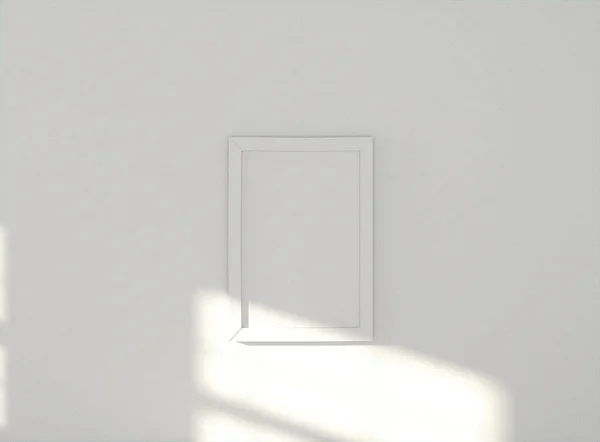 Комната с пустой рамкой на стене — стоковое фото