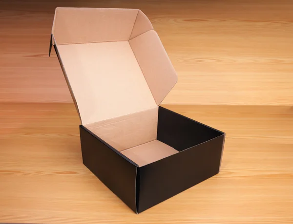 Open box on wood background