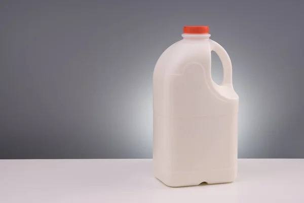Grande galão de plástico de leite — Fotografia de Stock