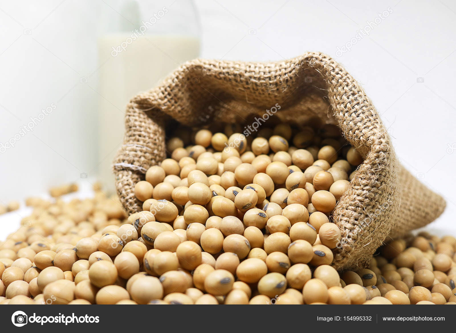 Raw Dried Soybean Or Soya Bean In Wooden Bowl And Sack Bag. Stock Photo,  Picture and Royalty Free Image. Image 130027394.