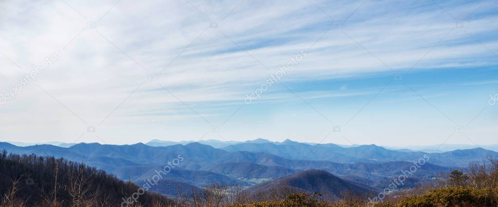 Blue ridge mountains.  Mountain National Park wide horizon landscape background layered hills and valleys large format pano panoramic