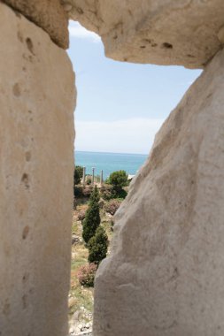 A Peak through the fort walls of Ancient Byblos Ruins clipart