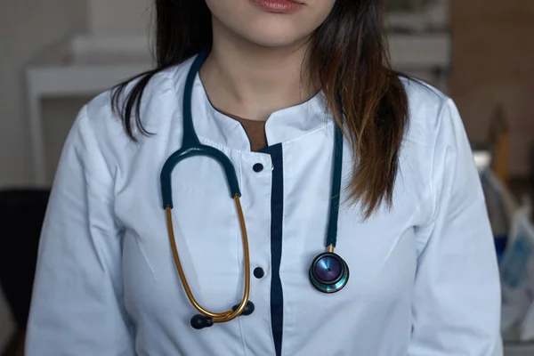 Blue Phonendoscope Located Chest Doctor Doctor Woman White Coat Workplace — Stock Photo, Image