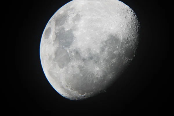 Moon the dark black sky isolated closeup — Stock fotografie