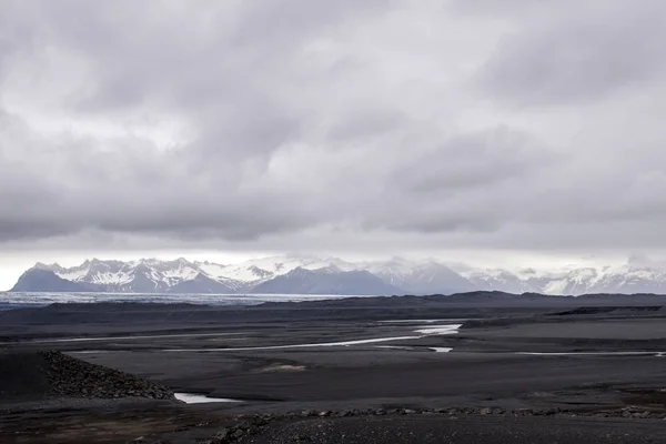 Epic Landscape Iceland grey rocks river glacier