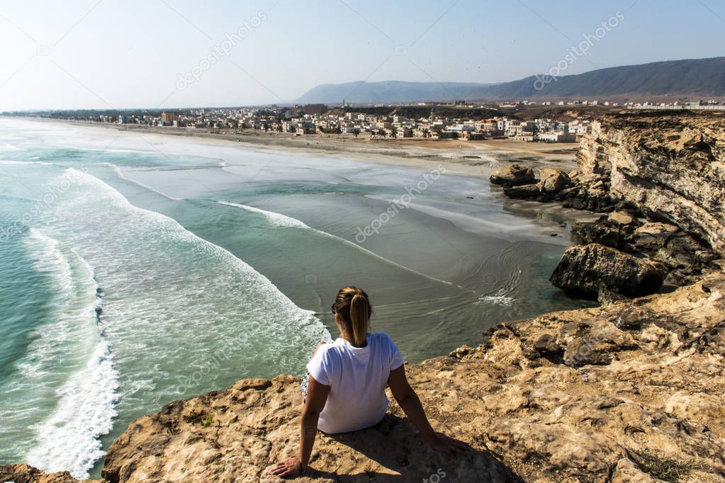 girl coastside view Taqah plateau City Salalah Dhofar Sultanate Oman 3