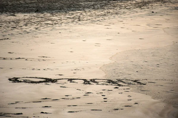 Signer le texte écrit Oman sur salalah plage dhofar région — Photo