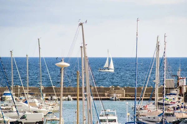 Yacht boat and Fishing boats in harbor on sardegna island in italy — Stock Photo, Image