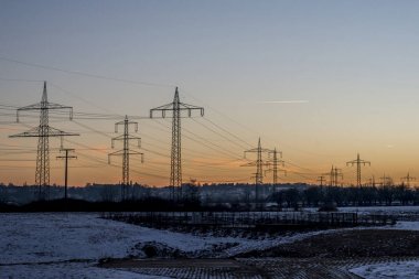 Winter electric power lines steel tower landscape Snow white sunset sunrise dawn 5 clipart