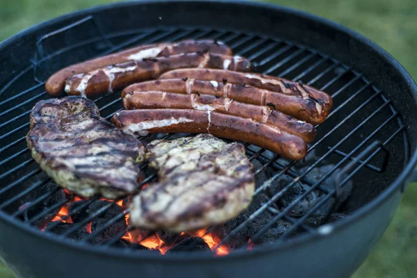 Delicious grilled meat over coal on barbecue grill bbq — Stock Photo, Image