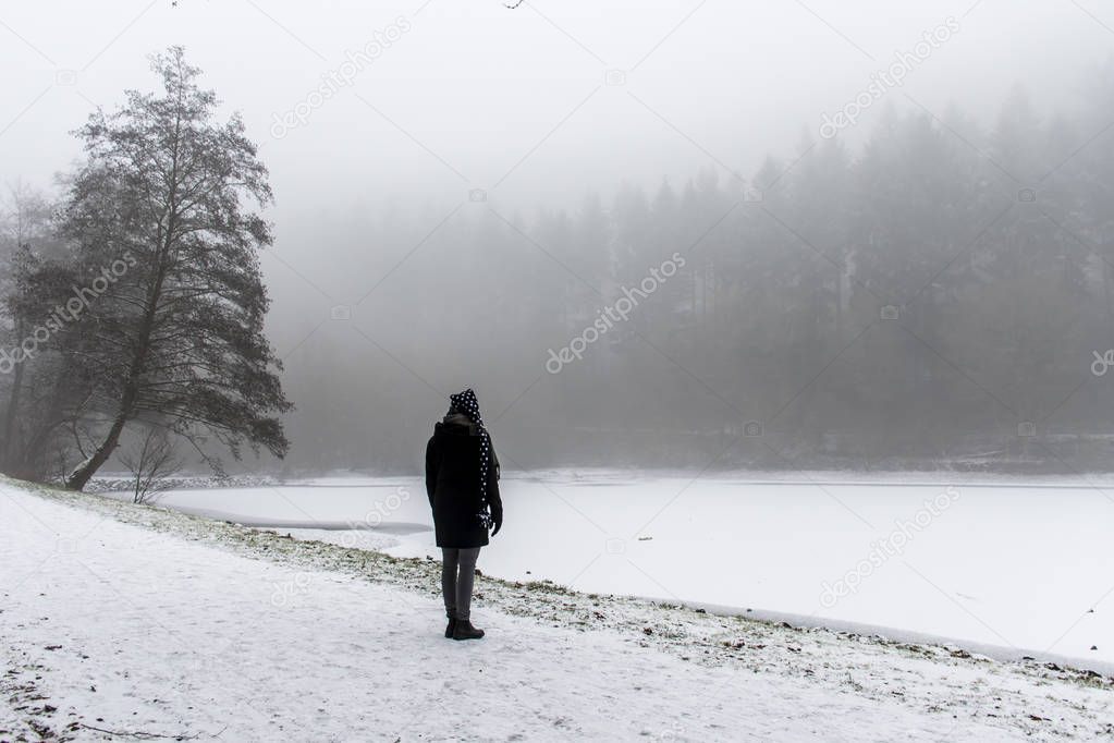 Girl lonely walking path and trees Winter wonder land