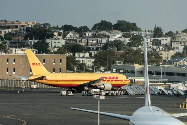 Boston USA 23.09.2017 DHL cargo aircraft parked loading at boston international Airport — Stock Photo, Image