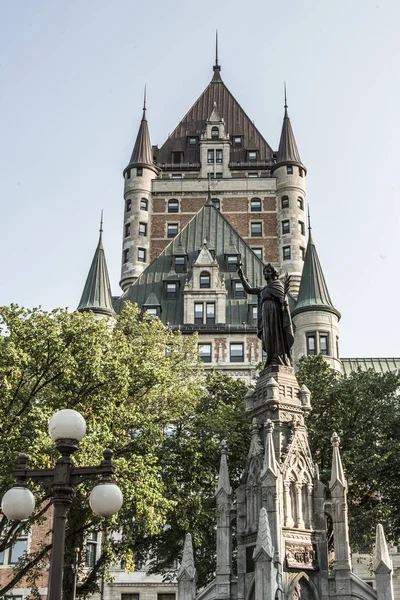 Canada Quebec City Fountain Monument of Faith woman in front of Chateau Frontenac tourist attraction UNESCO Heritage