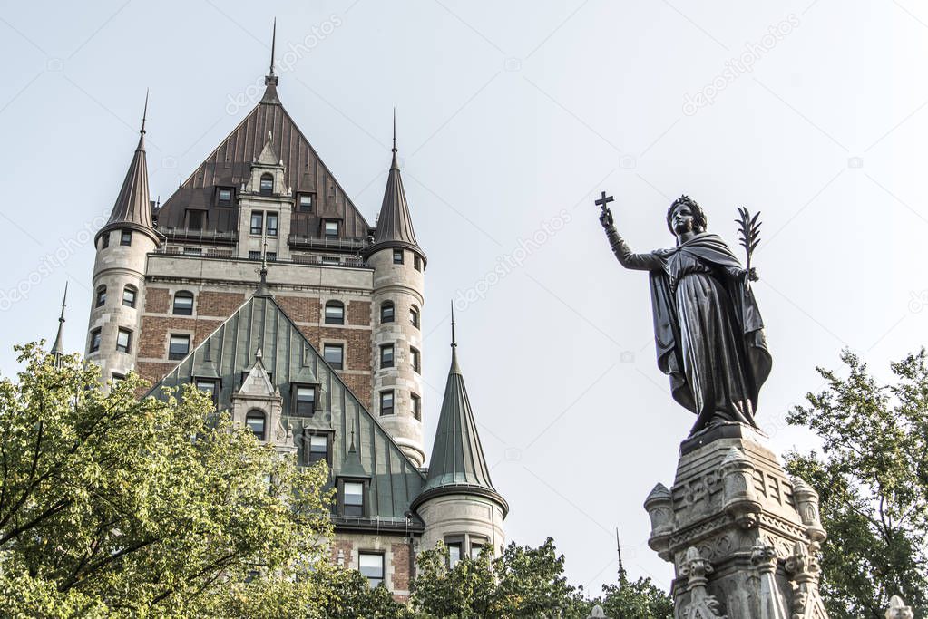 Canada Quebec City Fountain Monument of Faith woman in front of Chateau Frontenac tourist attraction UNESCO Heritage