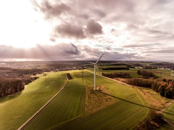 Panorama aerial helicopter view over wind farm landscape in Germany with white generator turbines — Stock Photo, Image