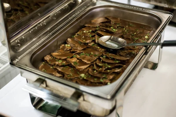 Food buffet self service lunch or dinner with quality beef slices in sauce in stew — Stock Photo, Image