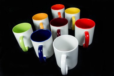 insulated unprinted cups for sublimation of different shapes, colors and designs designer on a black background isolated clipart