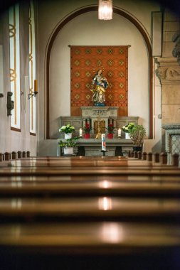 Rieden Germany 15.04.2018 The interior of a simple church with empty seat rows clipart