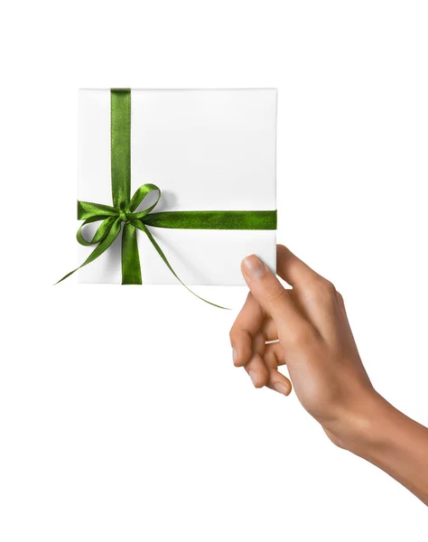 Isolated Woman Hands holding Holiday Present White Box with Green Ribbon on a White Background — Stock Photo, Image